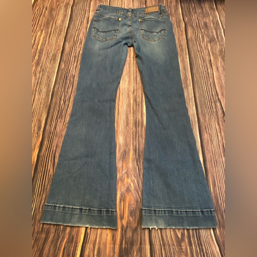 Rock & Roll Trouser Jeans Size 29x34. Belt loop patch. frayed pockets and hems.